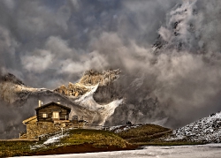 Dramatic dusk. Storm os coming. Passe Rolle Dolomites Italy